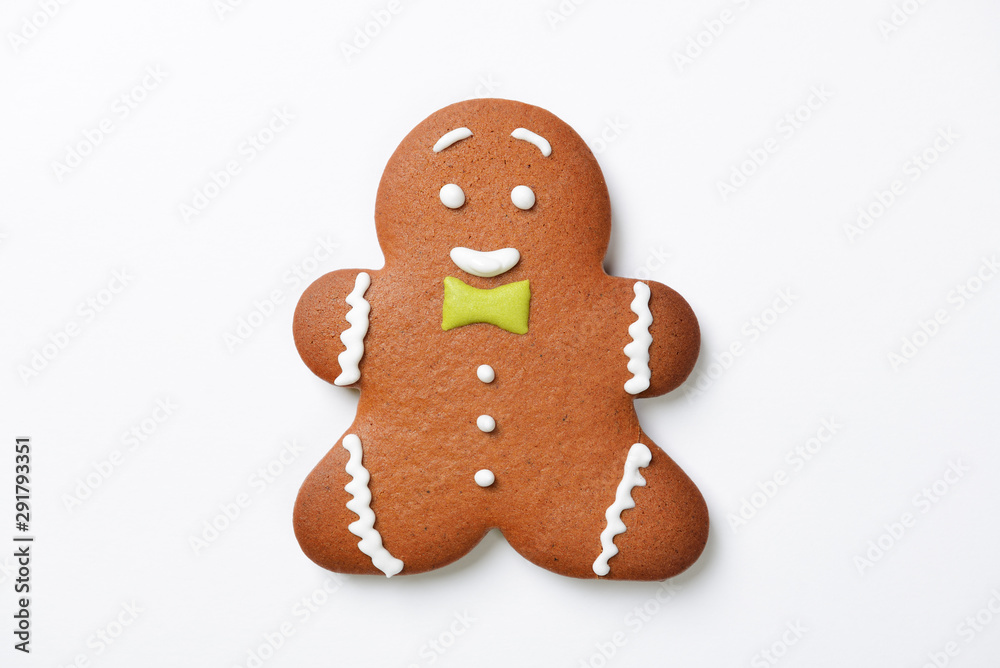 The hand-made eatable gingerbread little man on white background The hand-made eatable gingerbread little man on white background