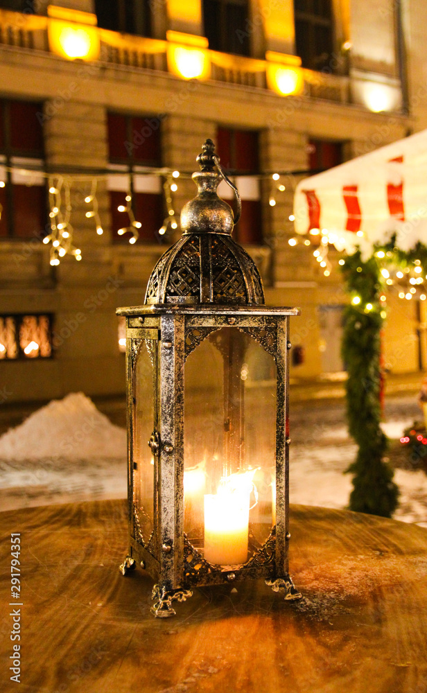 Street lantern in Christmas market in night Riga, Latvia