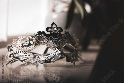 A portrait of a venetian mask shrouded by mystery. Hide your identity for a masked ball, halloween party or for carnaval.