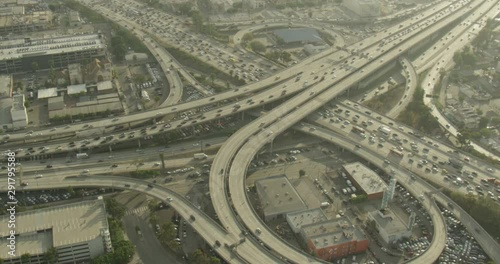 Helicopter aerial shot steady on Los Angeles freeway, overcast day