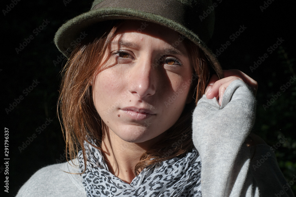 Young girl, wearing casual clothes, photographed on the beach in winter. Young girl, wearing casual clothes, photographed on the beach in winter.