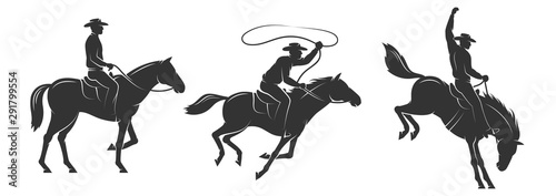 Canvas Print Cowboy rides a horse and throws a lasso
