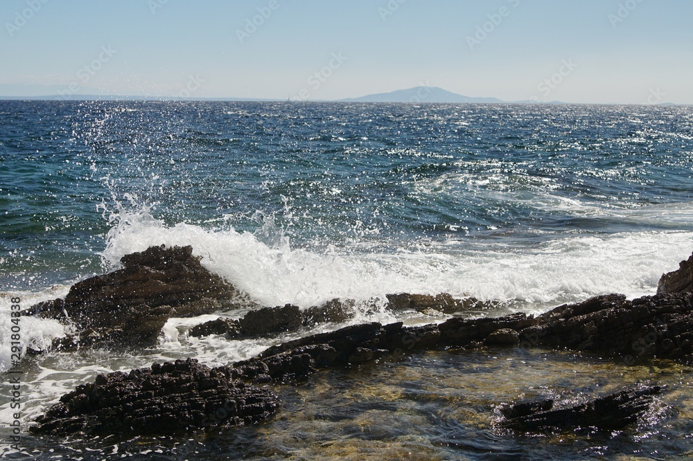 waves crashing on rocks waves crashing on rocks