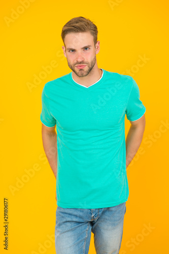 Modern male hairstyle. Male beauty. Barber hairdresser salon. Bearded man. Keep youth. Hairstyle for hipster. Handsome man yellow background. Well groomed guy with bristle and stylish hairstyle