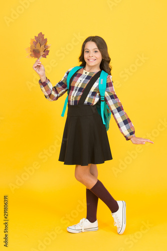 Happy schooling. Cute schoolgirl going to school. Small schoolgirl concept. Little kid. Great back to school deals on everything you need to learn in style. Schoolgirl with backpack and fallen leaves