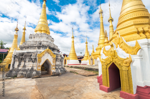 golden pagodas at inle lake, myanmar