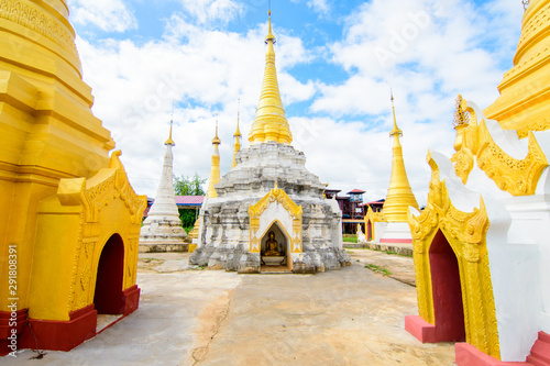 golden pagodas at inle lake, myanmar
