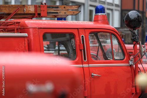 some historic red fire trucks