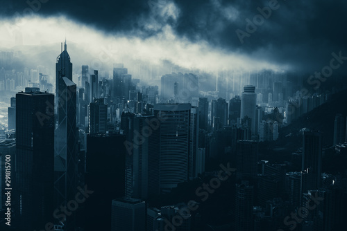 blue illuminated  filter image of city urban night light, Hong Kong skyline infrastructure building in downtown cityscape, aerial landscape view