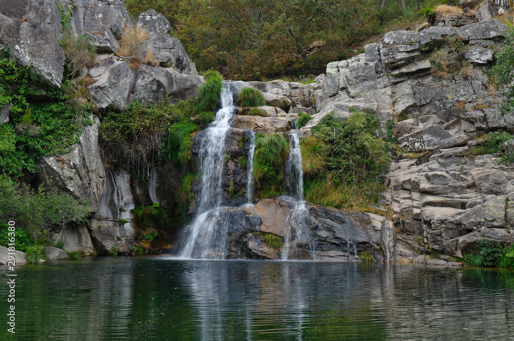 Waterfall at a natural spot called Poço Negro in Carvalhais, Sao Pedro do Sul, Portugal