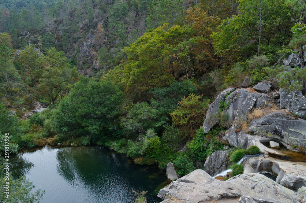 Waterfall at a natural spot called Poço Negro in Carvalhais, Sao Pedro do Sul, Portugal