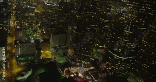 Aerial shot, night, fly around and examine la skyscrapers at night, drone