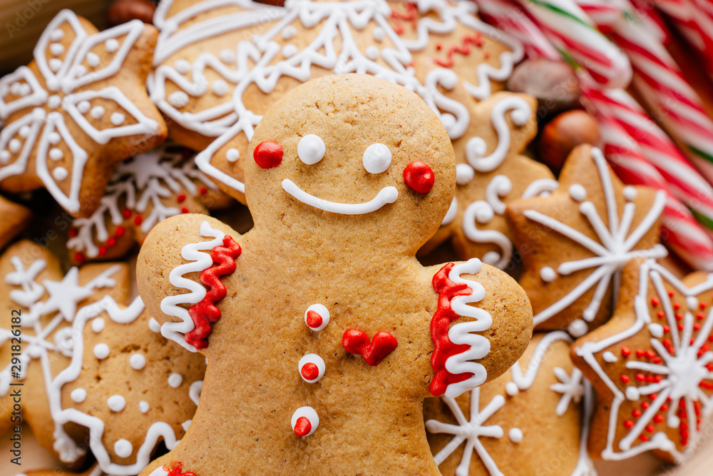 Christmas and New Year celebration traditions. Texture with homemade gingerbread cookies. Family home bakery, cooking festive sweets Christmas and New Year celebration traditions. Texture with homemade gingerbread cookies. Family home bakery, cooking festive sweets