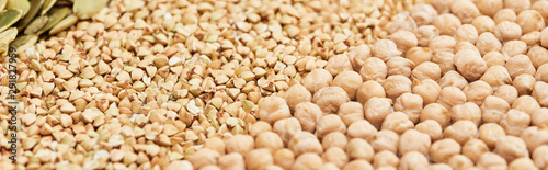 panoramic shot of raw buckwheat and chickpea