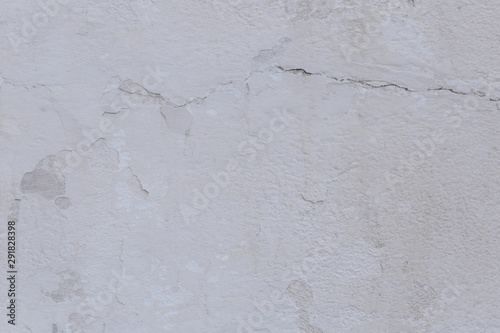 Texture of the old concrete wall with scratches, cracks, dust, crevices, roughness, stucco. Can be used as a poster or background for design.  © INTHEBLVCK