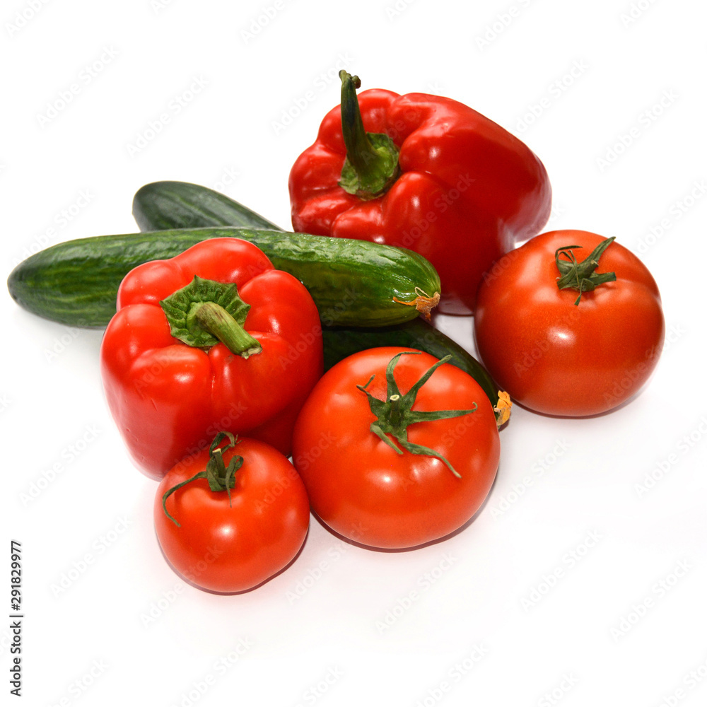 Tomato, cucumber, bell pepper on white background. Isolated backdrop. Macro. Closeup. Fresh vegetables. Organic food. Tomato, cucumber, bell pepper on white background. Isolated backdrop. Macro. Closeup. Fresh vegetables. Organic food.