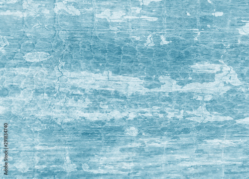 Old blue background with layers of grunge texture designs and peeling paint and shabby barn wood