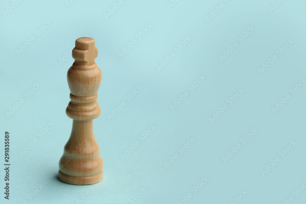 wooden chess pieces, white king, business concept, close-up, copy space wooden chess pieces, white king, business concept, close-up, copy space