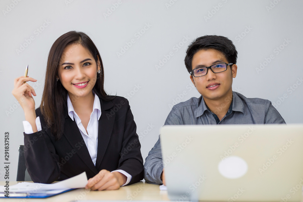 Two business a smile and meeting creative coworkers working with new startup project in office, Teamwork concept Two business a smile and meeting creative coworkers working with new startup project in office, Teamwork concept