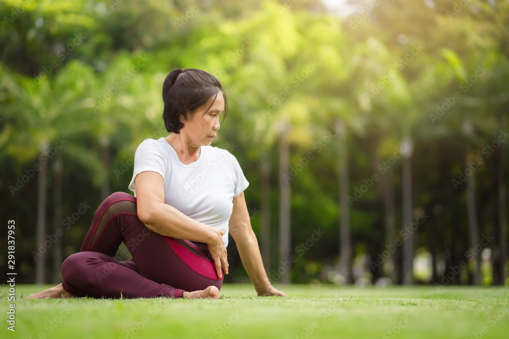 Senior Asian woman practicing yoga exercise outdoor in the morning. senior healthy lifestyle concept. Senior Asian woman practicing yoga exercise outdoor in the morning. senior healthy lifestyle concept.