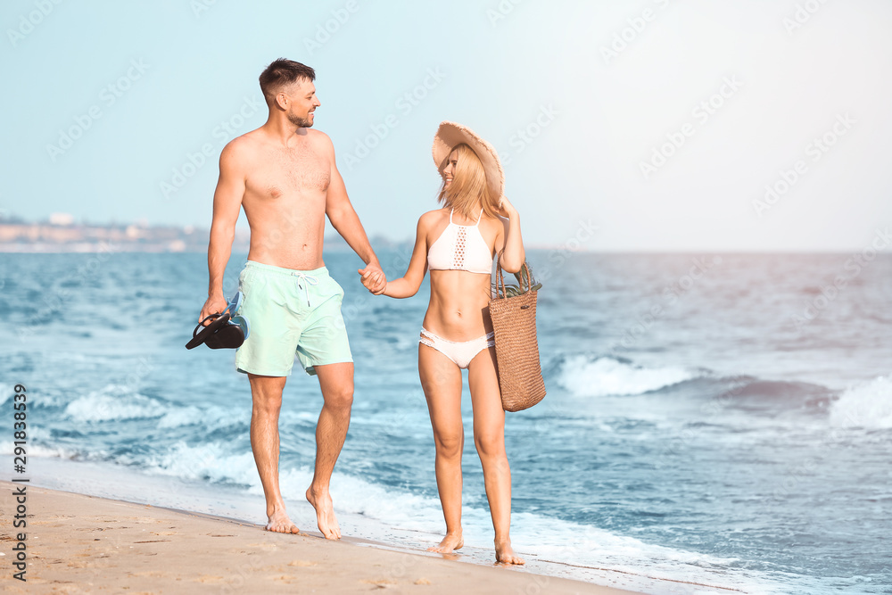 Happy couple spending time at sea resort Happy couple spending time at sea resort