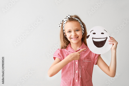 Little girl with drawn emot...