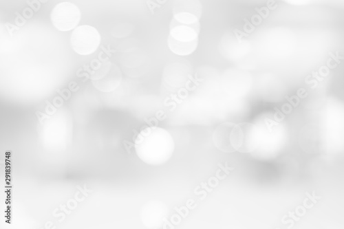 Abstract black and white bright bokeh background with white table top for backdrop design, bokeh composition for , website, magazine or graphic for commercial campaign design