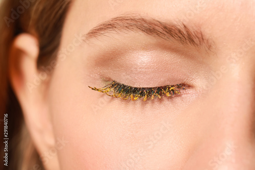 Young woman with creative eyelashes, closeup © Pixel-Shot
