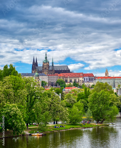 A view of Prague Castle across the Vltava River in Prague, Czech Republic. © Jbyard