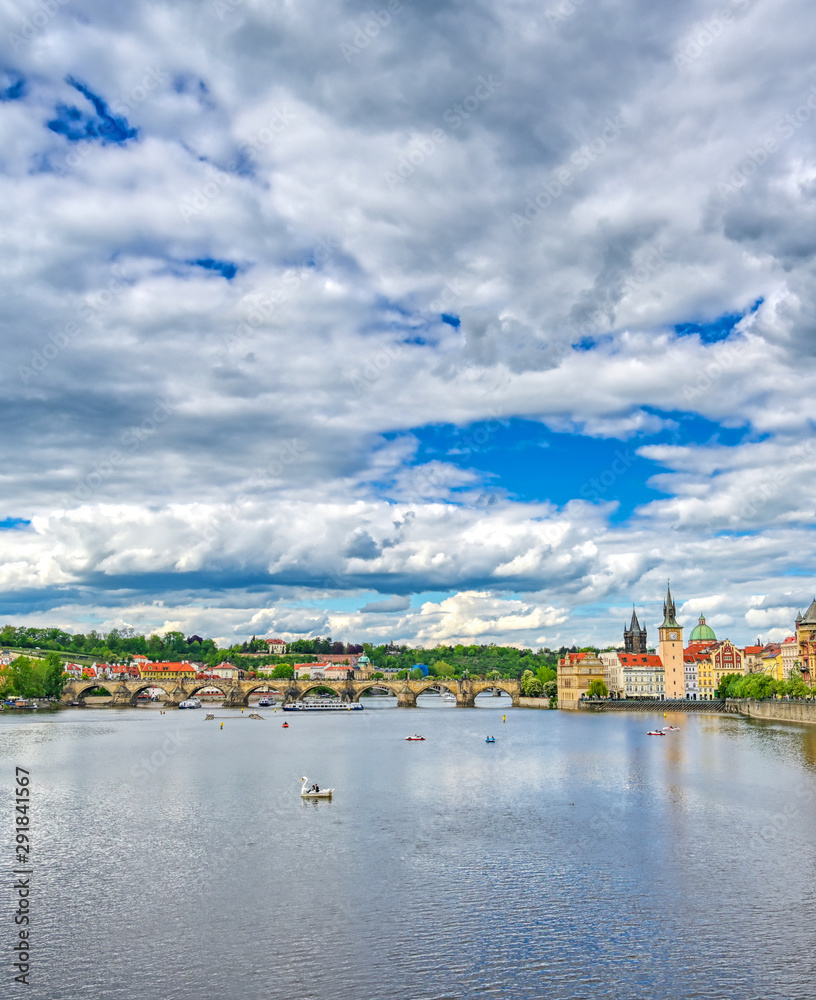 A view of Old Town Prague and the Charles Bridge across the Vltava River in Prague, Czech Republic.