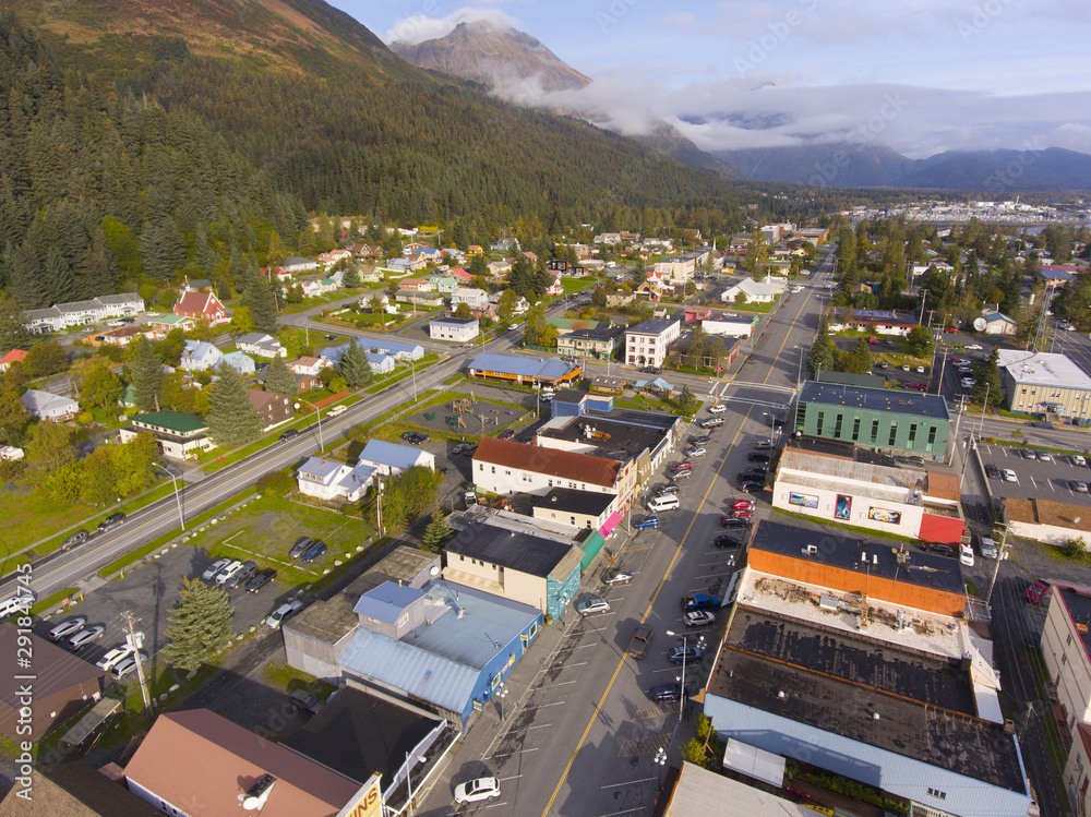 Aerial view of Seward city center and waterfront in fall, Seward, Kenai Peninsula, Alaska, USA. Seward is a city located on fjord Resurrection Bay at Gulf of Alaska on the Kenai Peninsula, near Kenai Aerial view of Seward city center and waterfront in fall, Seward, Kenai Peninsula, Alaska, USA. Seward is a city located on fjord Resurrection Bay at Gulf of Alaska on the Kenai Peninsula, near Kenai