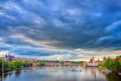 A view of Old Town Prague and the Charles Bridge across the Vltava River in Prague, Czech Republic.
