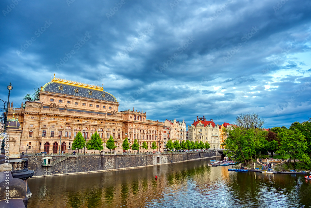 The National Theatre located in Prague, Czech Republic on the Vltava River.