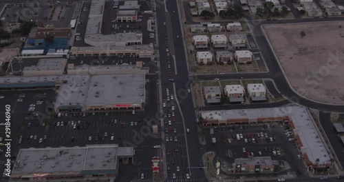 Helicopter aerial moving down suburban street in Nevada, drone photo