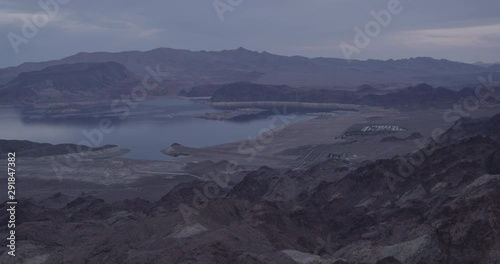 Tracking shot over mountains in ocean, drone, helicopter aerial