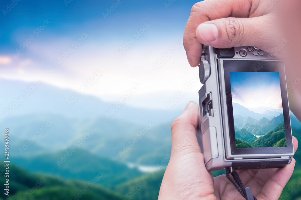 World Tourism Day concept:  take a photo mountain view
