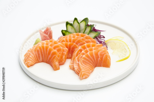 Salmon sashimi set in white plate on white background. Delicious Japanese sashimi set.