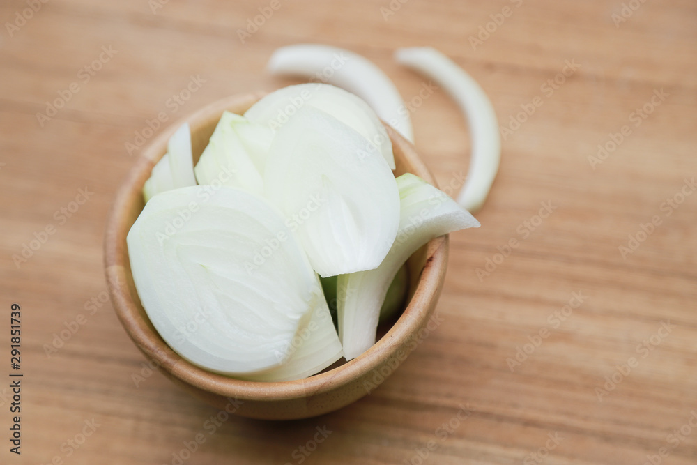 onion big slice on wooden table onion big slice on wooden table