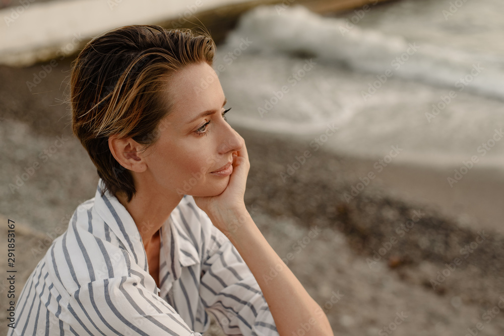 Portrait of pretty woman at the seaside Portrait of pretty woman at the seaside