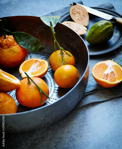 Still life of Mandarin Oranges on concrete countertop photo