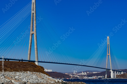 Russian bridge against the blue sky. © vvicca