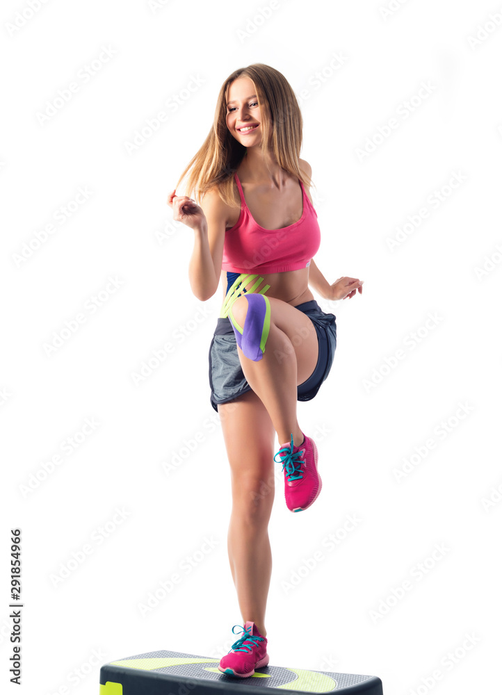 Beautiful young woman jumping on the steppe Beautiful young woman jumping on the steppe