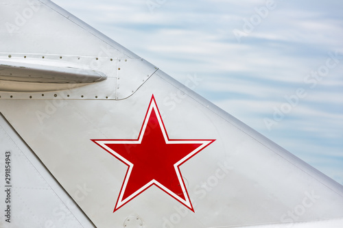 Tail-fin of a fighter jet photo