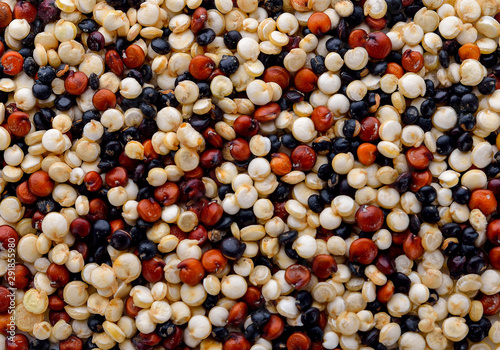 mixed red, white and black quinoa for background.