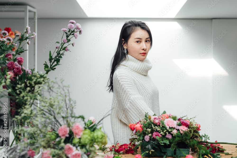 Young asian girls making flower arrangement