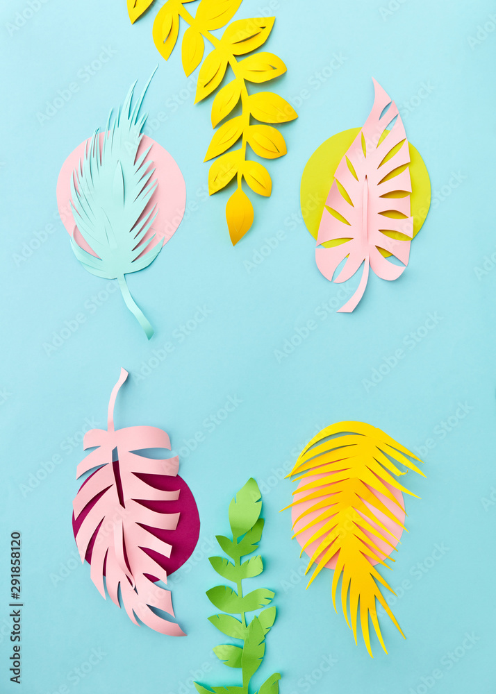 Handmade decorative paper pattern from tropical colorful leaves on a ...