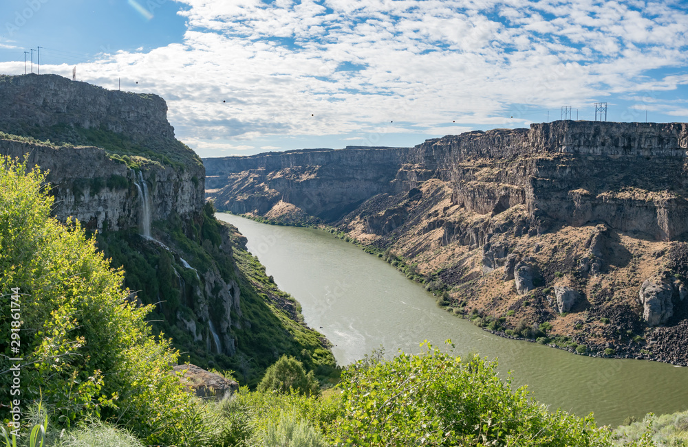 Fototapeta premium Snake Canyon River Gorge as seen from Snake River Rim Trail on sunny summer day near Shoshone Falls Park, Twil Falls, Idaho, USA
