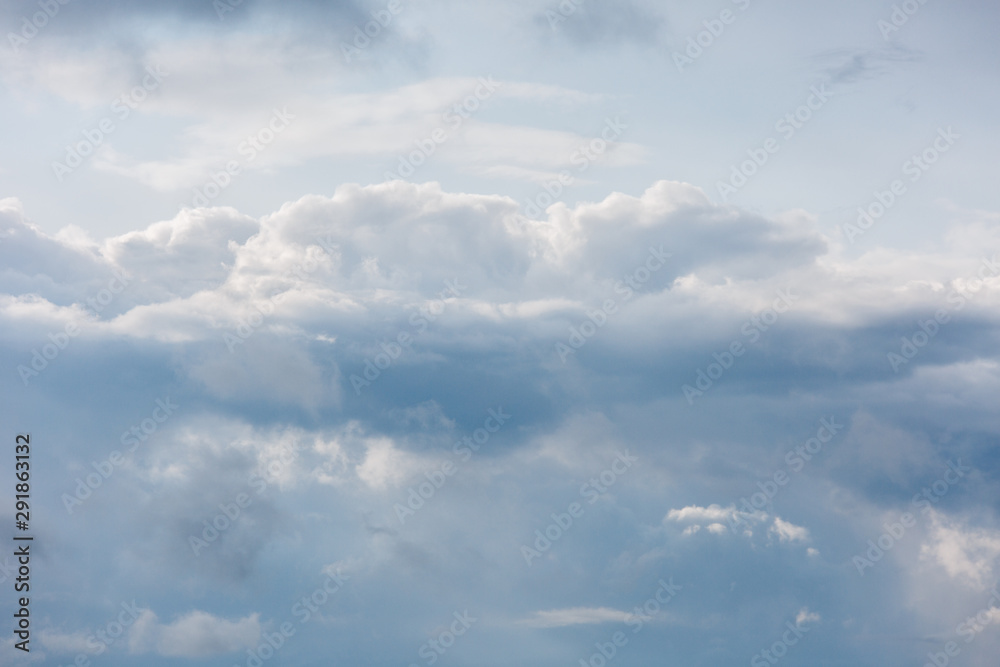 Thick beautiful clouds and clouds in the sky. Cloudy weather before the storm and rain.