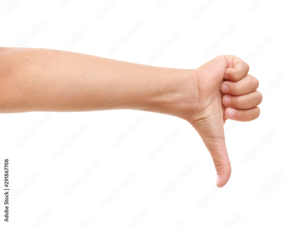 Child's hand showing thumb-down on white background Child's hand showing thumb-down on white background