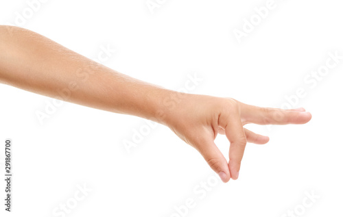 Child's hand holding something on white background © Pixel-Shot